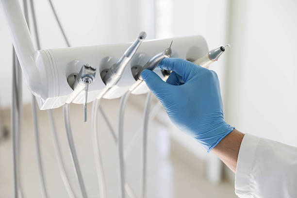 Professional Dental Implants technician working in Baywood, NY